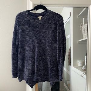 Blue knit sweater with white detailing